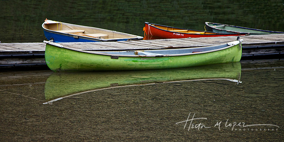 Green Canoe Reflection